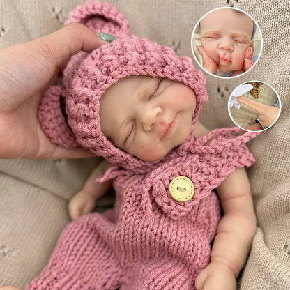 30cm Lifelike Silicone Closed Eyes Pascale Reborn Baby Girl in Red Knitted Overalls
