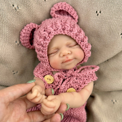 30cm Lifelike Silicone Closed Eyes Pascale Reborn Baby Girl in Red Knitted Overalls