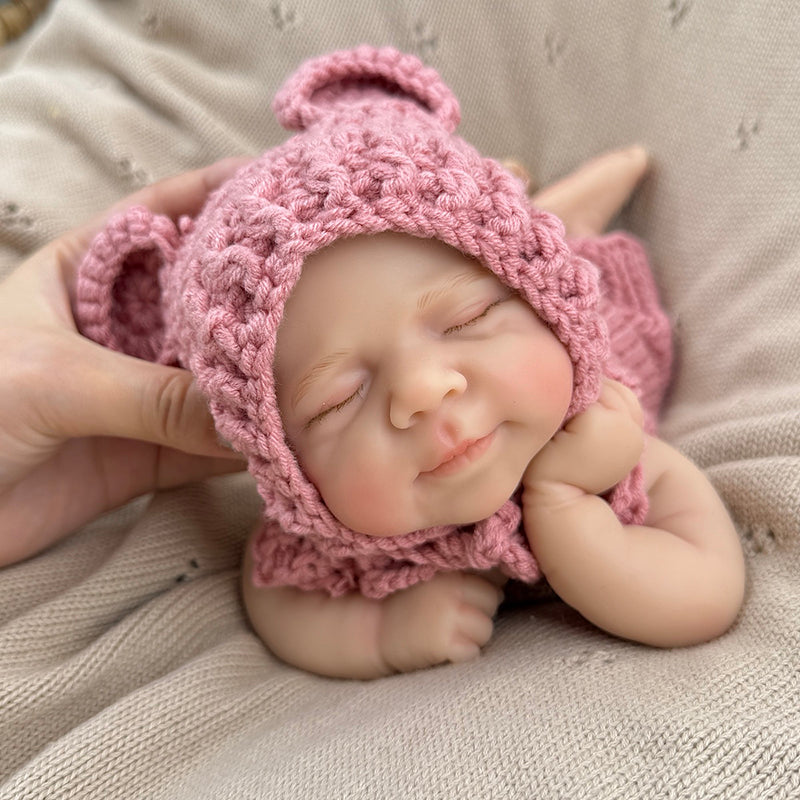 30cm Lifelike Silicone Closed Eyes Pascale Reborn Baby Girl in Red Knitted Overalls