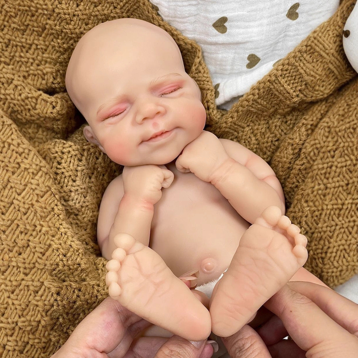 30cm Lifelike Full Silicone Closed Eyes Reborn Doll Pascale In White Plush clothes