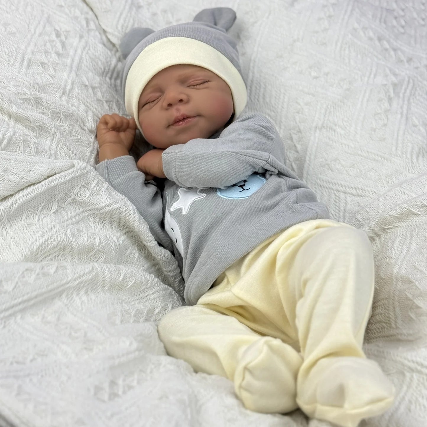 48cm Lifelike Soft Body Closed Eyes Dark Skin Reborn Doll Pascale