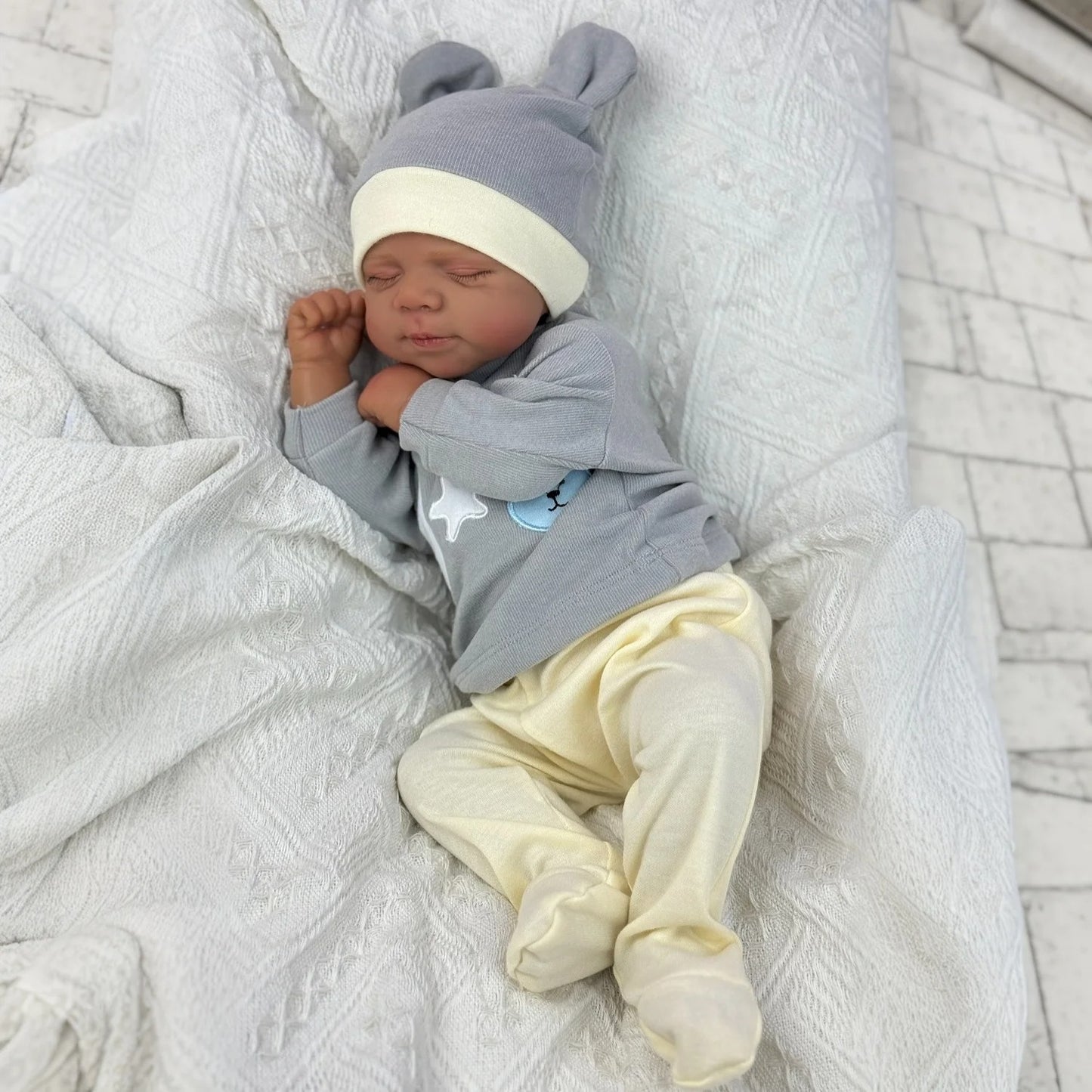 48cm Lifelike Soft Body Closed Eyes Dark Skin Reborn Doll Pascale