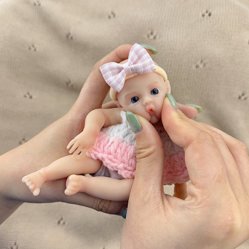 15cm Silicone Meadow Stretchable Mini Reborn Doll in White and Pink Sweater
