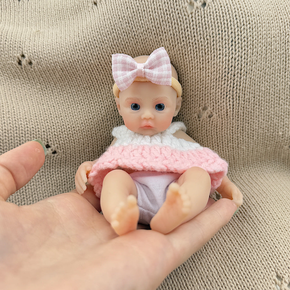 15cm Silicone Meadow Stretchable Mini Reborn Doll in White and Pink Sweater