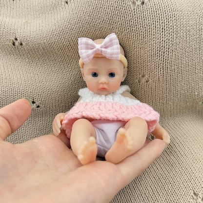 15cm Silicone Meadow Stretchable Mini Reborn Doll in White and Pink Sweater
