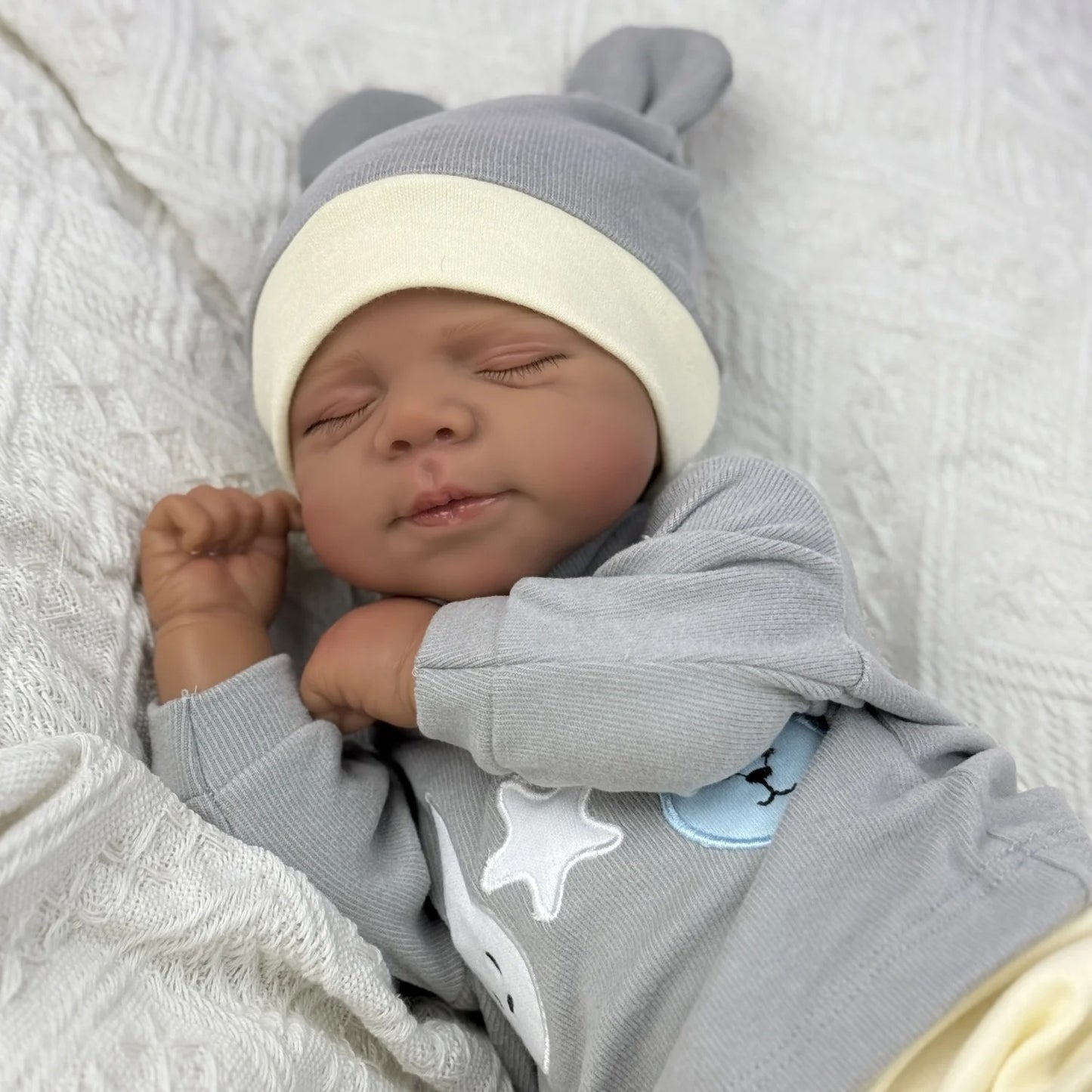 48cm Lifelike Soft Body Closed Eyes Dark Skin Reborn Doll Pascale