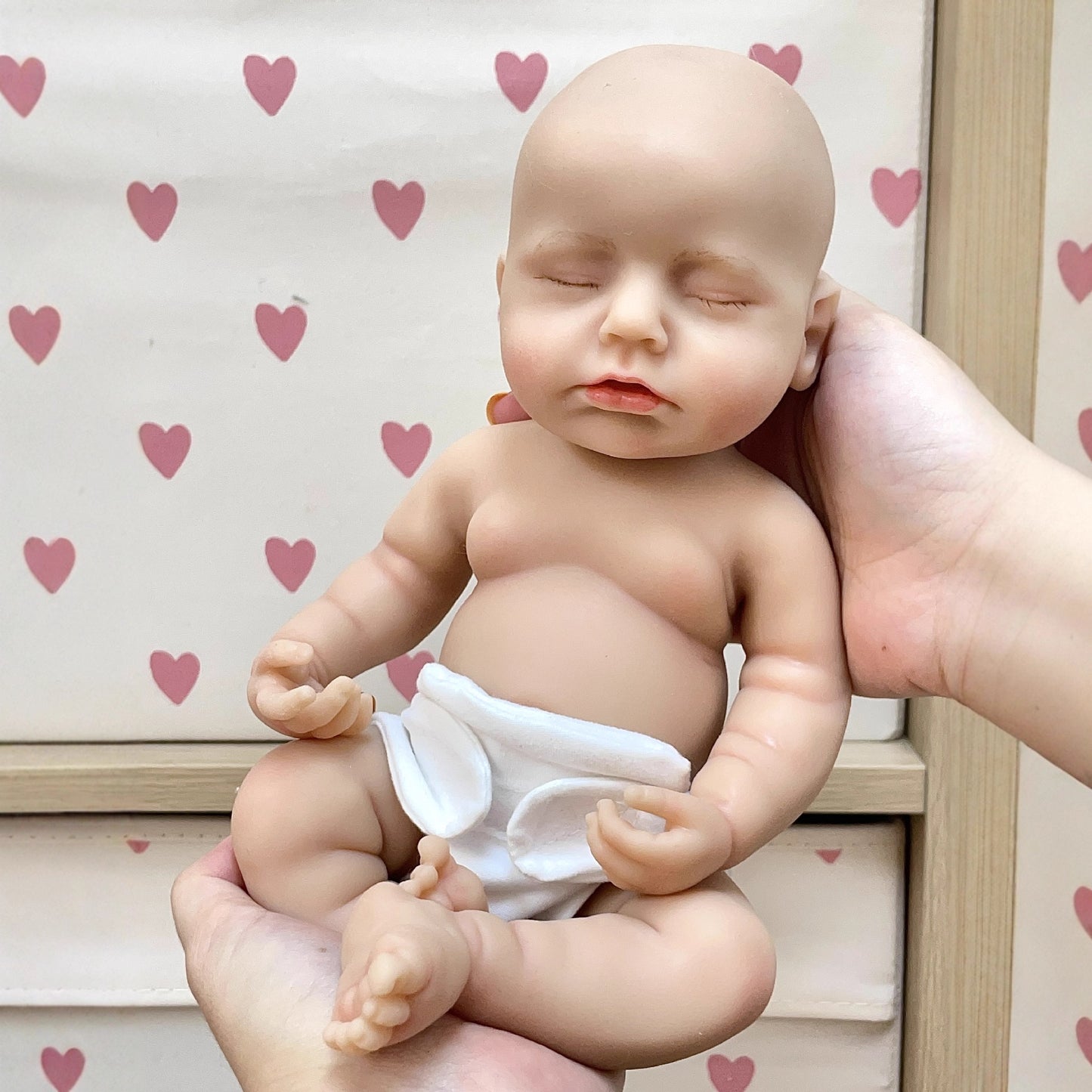 30cm Lifelike Full Silicone Closed Eyes Reborn Doll Girl In White plush clothes