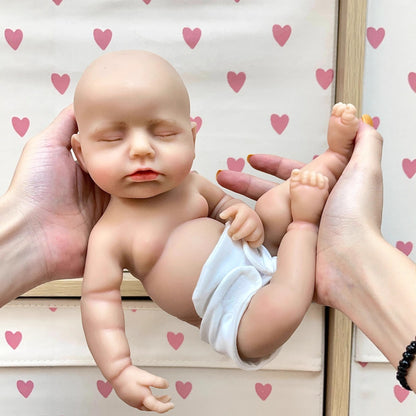 30cm Lifelike Full Silicone Closed Eyes Reborn Doll Girl In White plush clothes