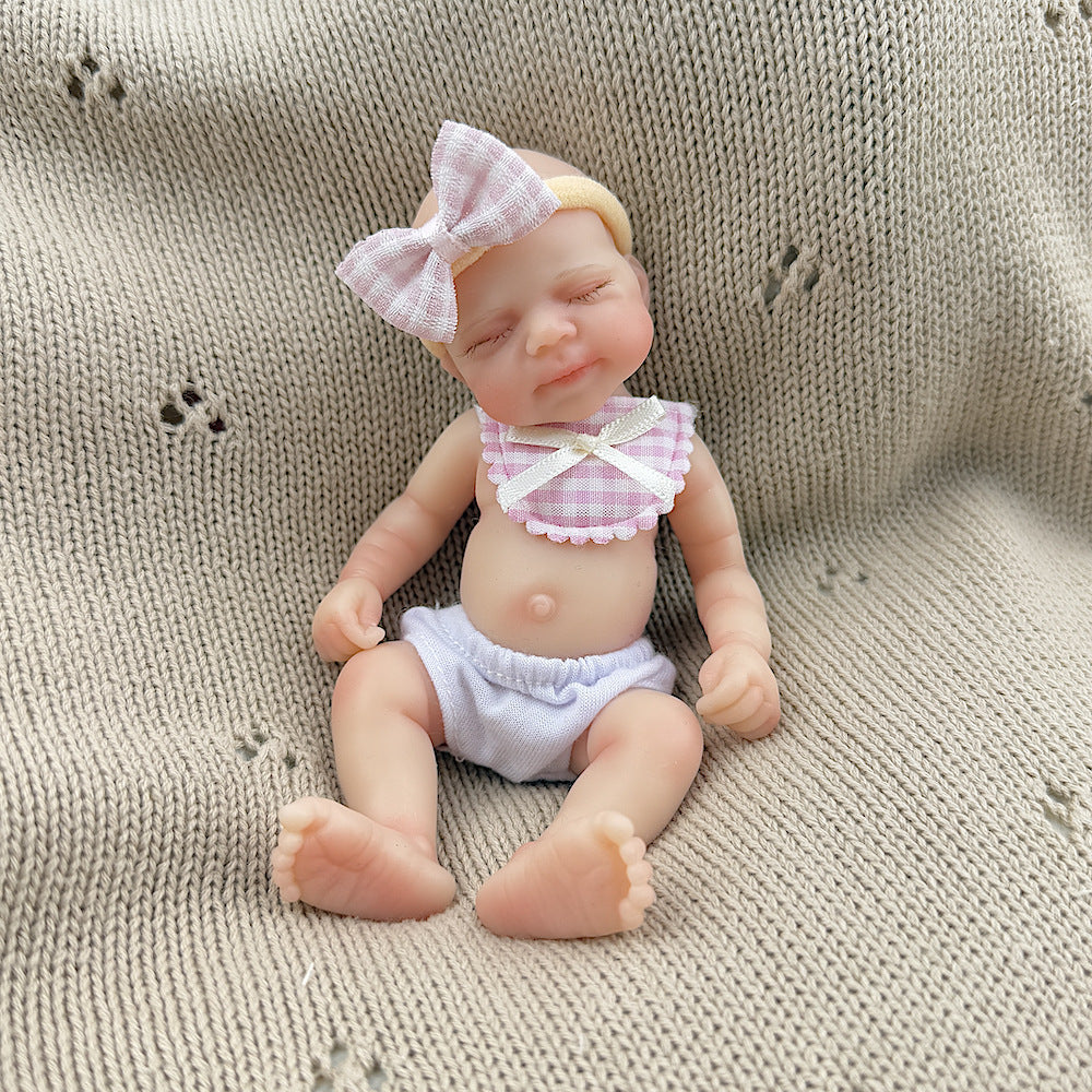 15cm Silicone Closed Eyes Pascale Mini Reborn Doll in Pink Plaid Bib
