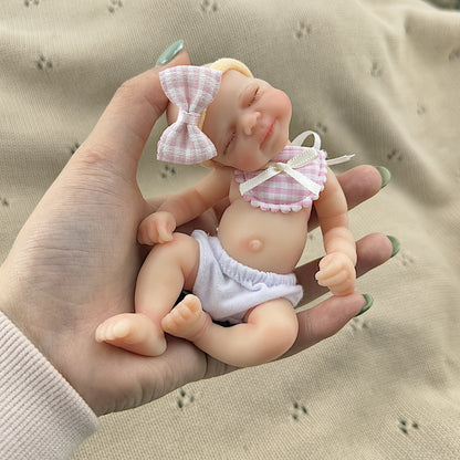 15cm Silicone Closed Eyes Pascale Mini Reborn Doll in Pink Plaid Bib