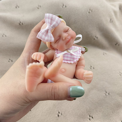 15cm Silicone Closed Eyes Pascale Mini Reborn Doll in Pink Plaid Bib