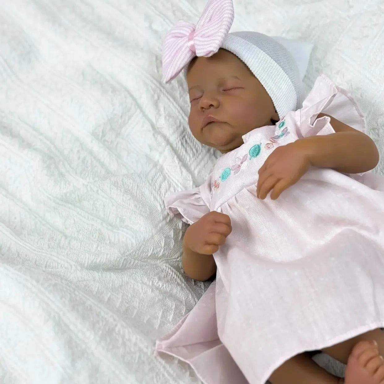 48cm Closed Eyes Dark Skin Soft Body Reborn Baby Levi in Pink Dress