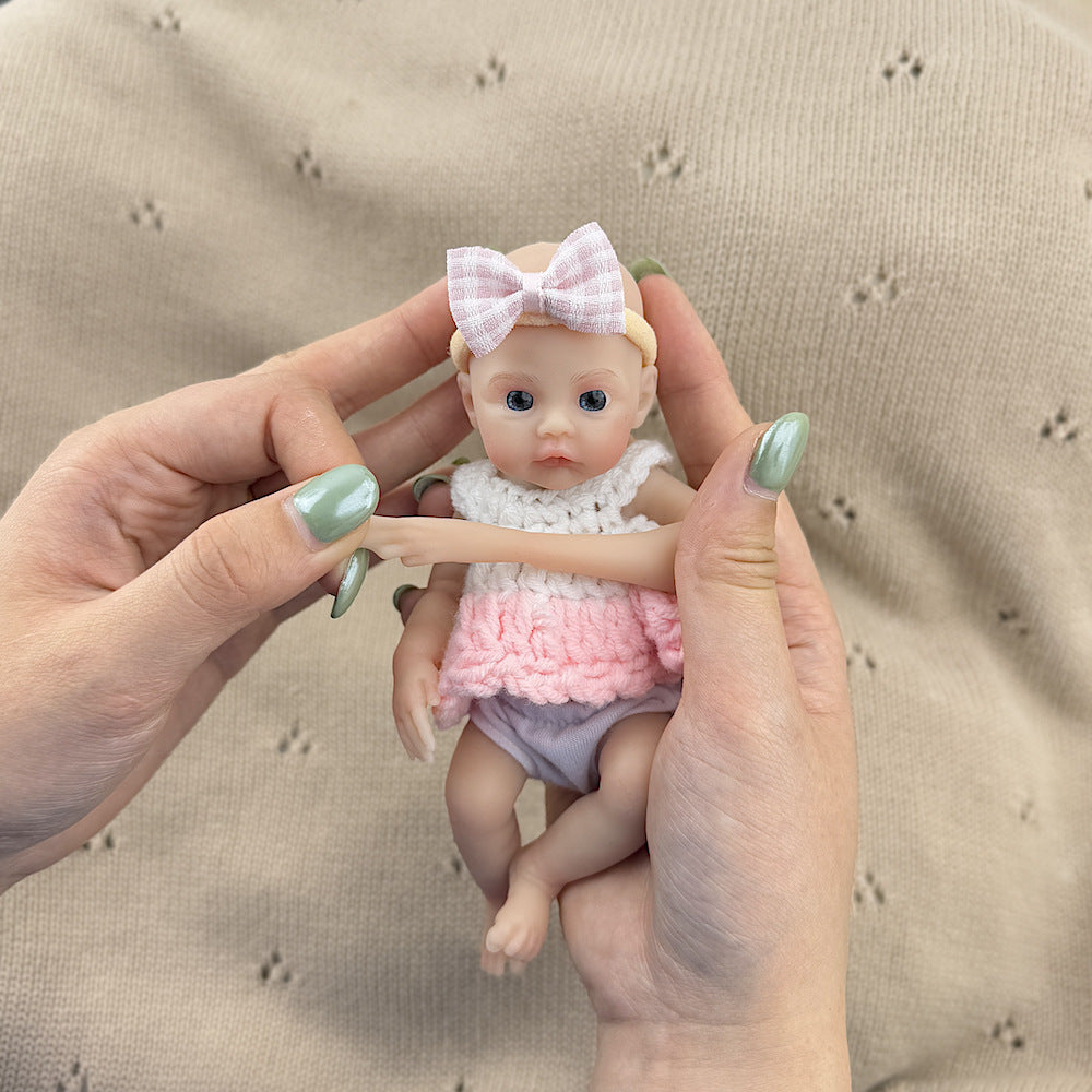 15cm Silicone Meadow Stretchable Mini Reborn Doll in White and Pink Sweater