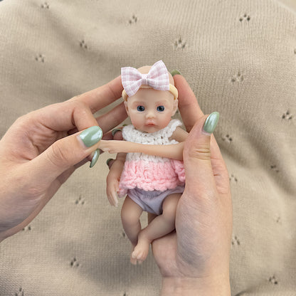 15cm Silicone Meadow Stretchable Mini Reborn Doll in White and Pink Sweater