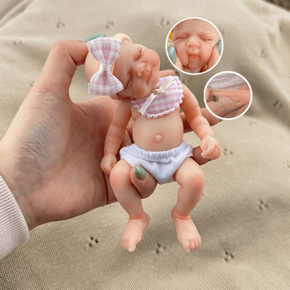 15cm Silicone Closed Eyes Pascale Mini Reborn Doll in Pink Plaid Bib