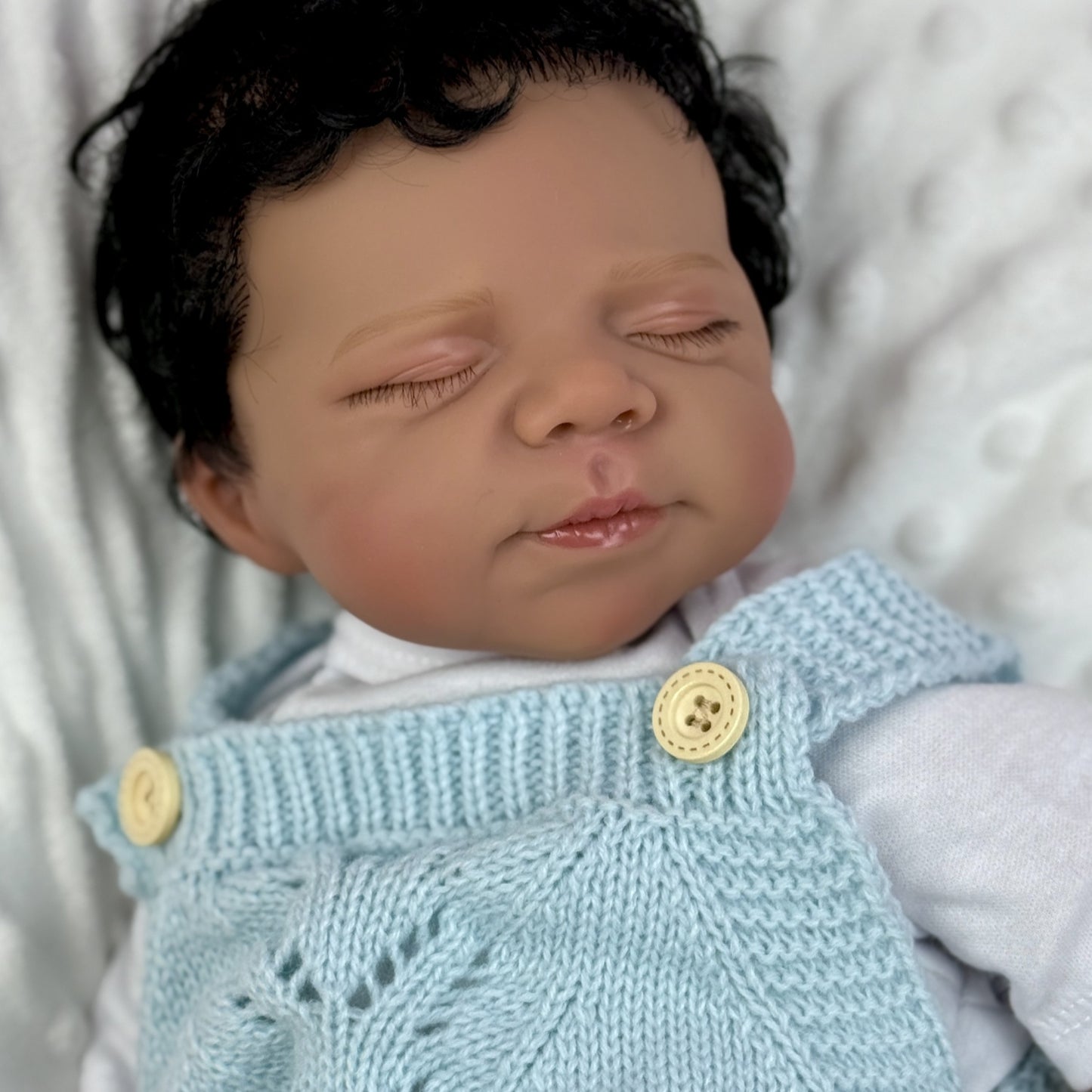 48cm Lifelike Soft Body Dark Skin Closed Eyes Reborn Doll Pascale