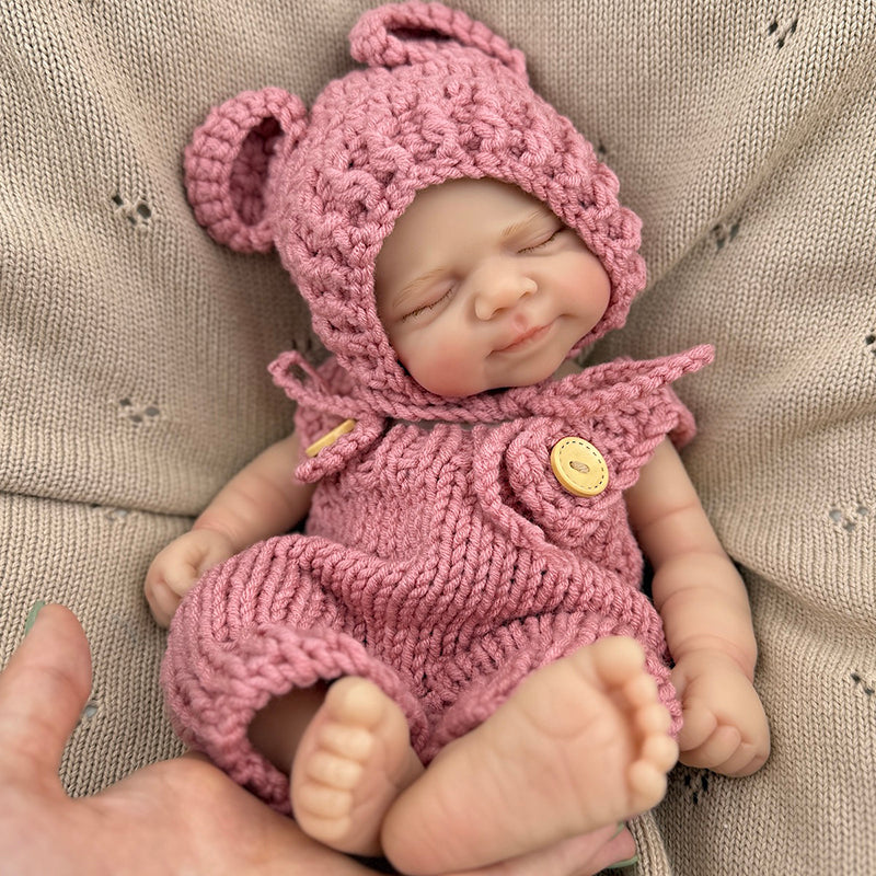 30cm Lifelike Silicone Closed Eyes Pascale Reborn Baby Girl in Red Knitted Overalls