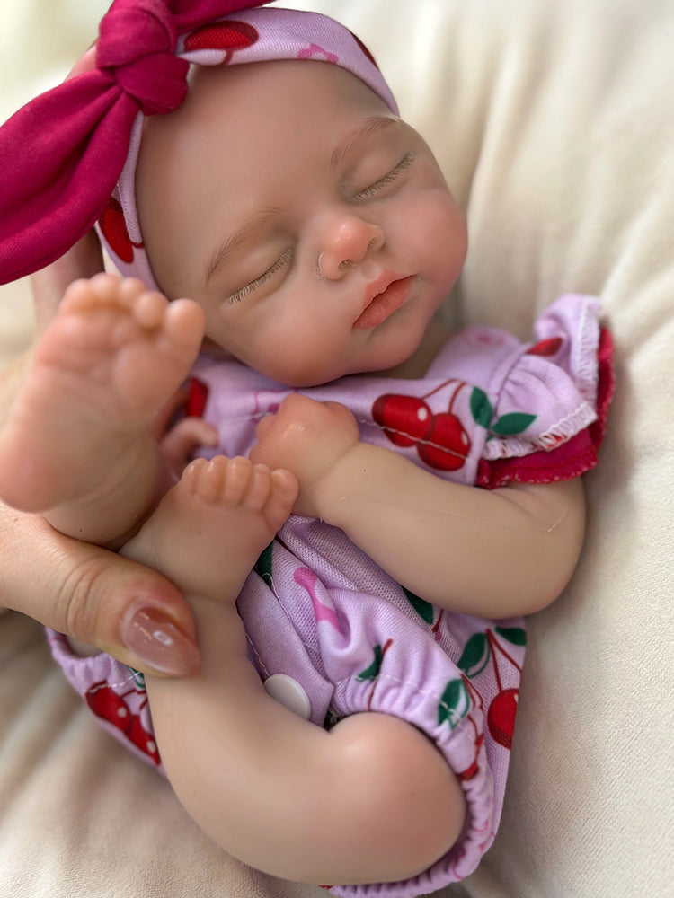 30cm Lifelike Closed Eyes Silicone Reborn Baby Girl Irys in Cherry Romper